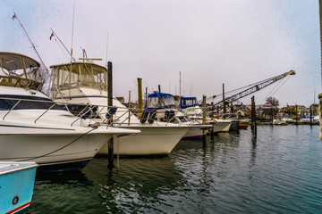 Fototapeta premium Fishing boats on pier of Jamaica Bay, Brooklyn