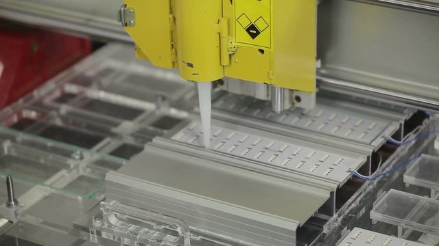 The modern machine glues the led Board on the lamp body
