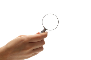 Woman holding magnifying glass on white background, closeup