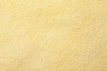 Fototapeta premium Corn flour as background, top view. Gluten free product