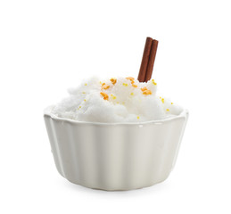 Snow ice cream with sprinkles and cinnamon in bowl on white background