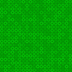 Abstract seamless pattern of small rings or pixels in green colors