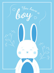 Greeting card with the birth of a child. This is a boy! Lovely bunny on a blue background.