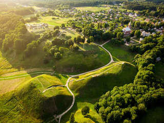 Aerial view of Kernave Archaeological site, a medieval capital of the Grand Duchy of Lithuania, tourist attraction and UNESCO World Heritage Site. - obrazy, fototapety, plakaty