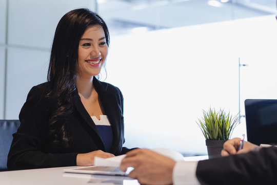 Asian woman answering question interview during job application.