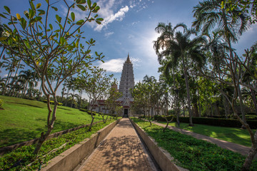 The background of a large pagoda (Wat Yansangwaram) is a major tourist attraction, with tourists always visited, in the area of Pattaya, Sattahip, natural background wallpaper with trees surrounded
