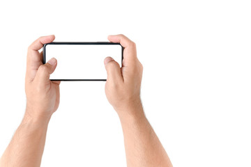 Man holding smartphone with blank screen