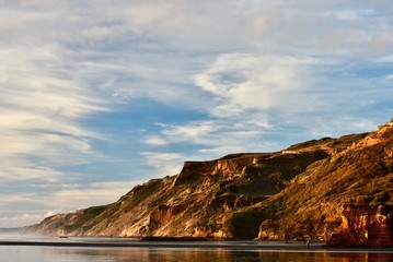 The “wild” West Coast of New Zealand: rugged coastal cliffs shaped by powerful processes of erosion and sedimentation due to wind and waves