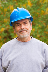 Contractor Builder with blue hardhat