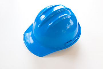 Fototapeta premium Blue hardhat isolated on white