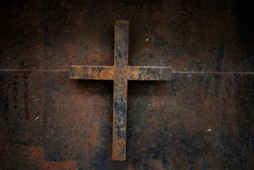 rusty cross - old and rusty cross iron door  rusty grunge background