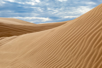 Fototapeta na wymiar Ridges and textures at the Imperial Sand Dunes in California