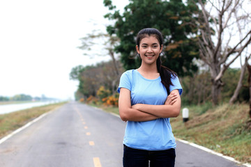 Girl are standing in park.