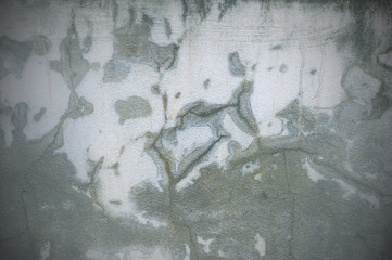 abstract grunge background, Old sand on the terrace outside. There are black stains on the surface of the sand. Must be cleaned by washing.