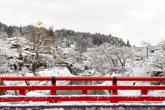 Nakabashi Bridge With Snow Fall And Miyakawa River In Winter Season . Landmark Of Hida , Gifu , Takayama , Japan . Landscape View