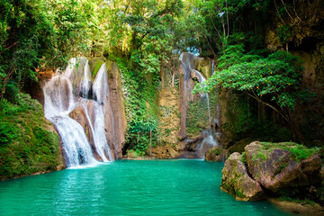 Dimiao Twin waterfalls in a mountain gorge in the tropical jungle of the Philippines, Bohol.