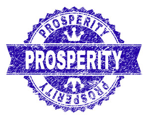 PROSPERITY rosette stamp seal imprint with grunge style. Designed with round rosette, ribbon and small crowns. Blue vector rubber watermark of PROSPERITY caption with dust style.