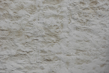 Fragment of old gray brick stone wall background