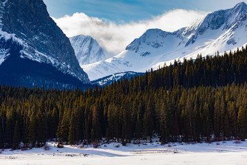 Winter in the mountains under clear blue skies