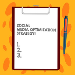 Writing note showing Social Media Optimization Strategy. Business photo showcasing SEO Advertising Marketing strategies Sheet of Bond Paper on Clipboard with Ballpoint Pen Text Space