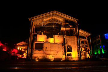 idle cement plant at night
