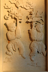 Children carved stone in the park