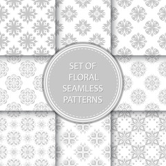 Fototapeta na wymiar Compilation of floral patterns. Gray design with flowers on white background
