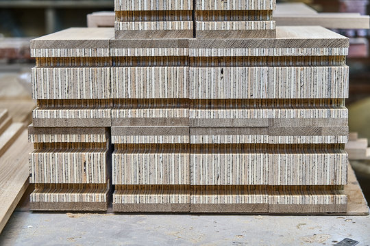 Wood door manufacturing process. Door frame elements. Furniture manufacture.