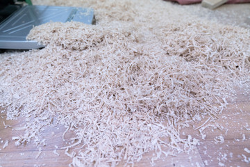 Technician handles a variety of woodworking tools to make wooden products. Both hand and machine tools are used after carpenters measure exact size by different types of rulers.