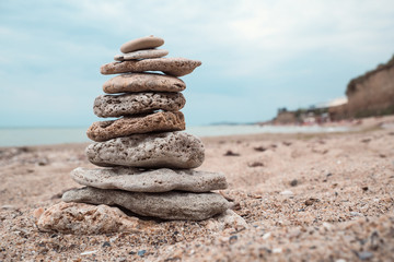 Fototapeta premium Stack of stones on beach