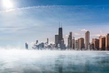 Foto op Plexiglas Fog covers Lake Michigan along Chicago Downtown shoreline. Winter polar vortex © marchello74
