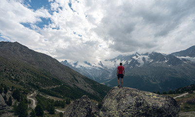 Man looking over mountains