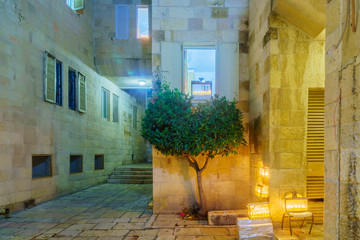 Alley in the Jewish quarter, with Traditional Menorahs. Jerusalem