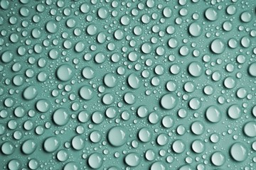 drops water on blue background