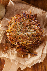 Hash brown, potato pancakes on paper