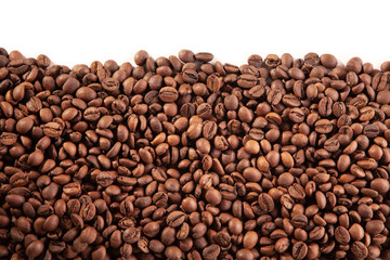  Textured brown coffee beans on a white background.