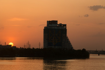 sunset over the building