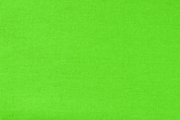 Green cotton fabric texture background, seamless pattern of natural textile.