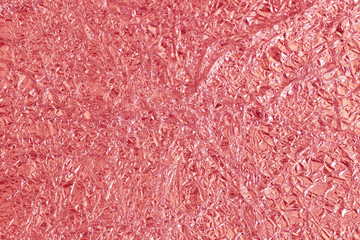 Fototapeta premium Rose gold foil shiny texture, abstract red wrapping paper for background and design art work.