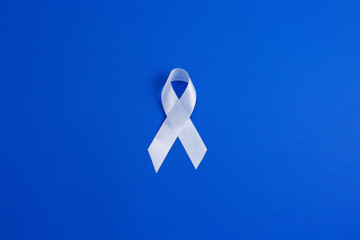 White color ribbon for raising awareness on Lung cancer and Multiple Sclerosis and international...
