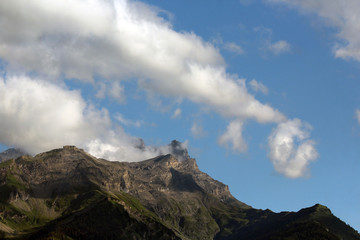 Mountain Peak And Clouds