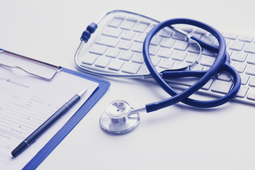 Tablet PC and medical equipments, medical technology concept. Stethoscope