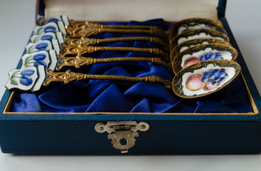 vintage teaspoons on blue background