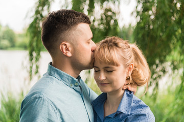 Fototapeta premium Couple in love in nature. Family walks in the park. Love.