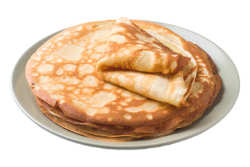 Thin pancakes on a plate isolated on a white background.