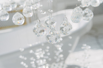 Crystal. Hanging suspension. Glass balls on a string.