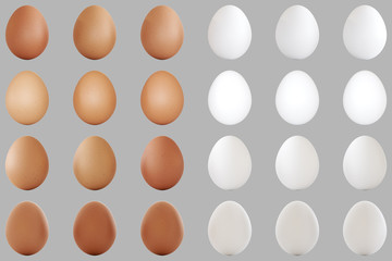 Photo realistic brown and white eggs on neutral background