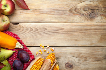 Autumn Fruits And Vegetables On Wooden Table