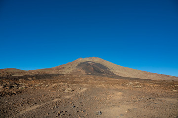Pico viejo volcano crater against deep blue sky