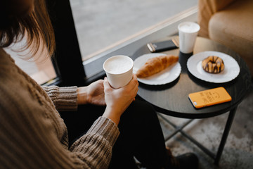 hands keep the coffee breakfast in the morning
